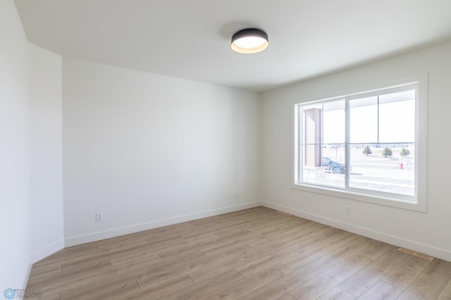 8030 59th St S, Horace, ND 58047 - unfurnished room with light wood-style flooring and baseboards