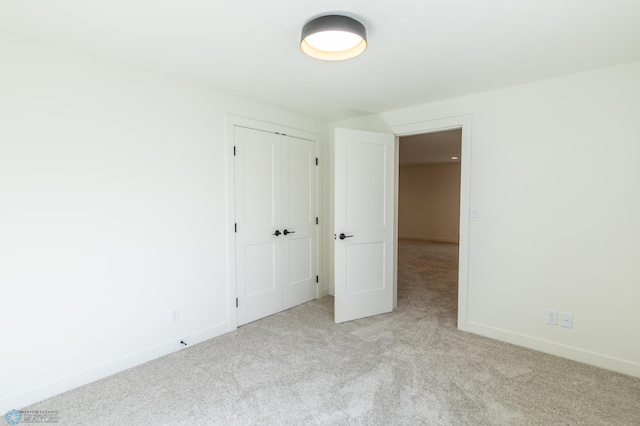8030 59th St S, Horace, ND 58047 - unfurnished bedroom featuring carpet floors, a closet, and baseboards
