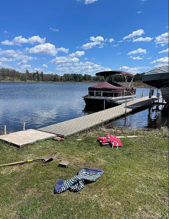 dock area with a water view