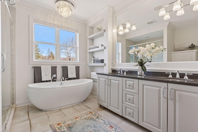 full bathroom featuring an inviting chandelier, built in features, a sink, and a stall shower
