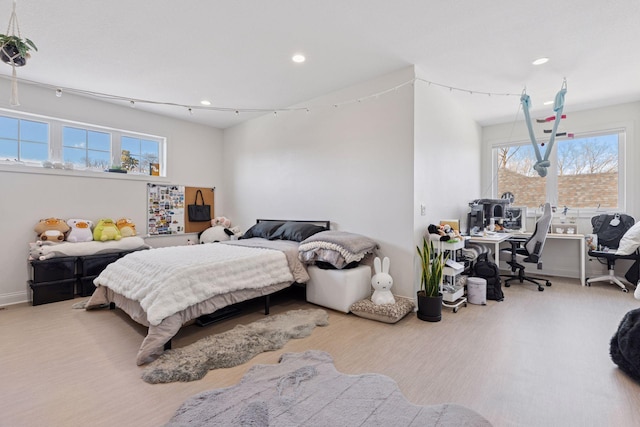 bedroom with baseboards and recessed lighting