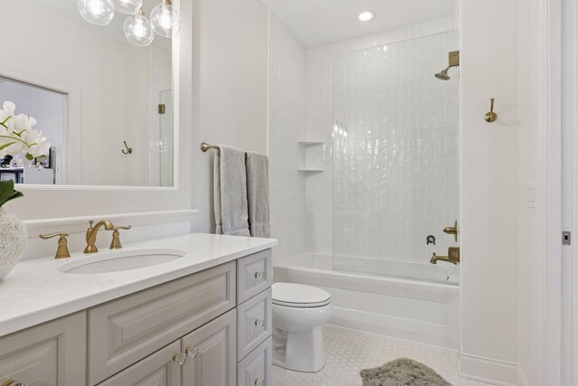 bathroom with tile patterned flooring, vanity, toilet, recessed lighting, and tub / shower combination