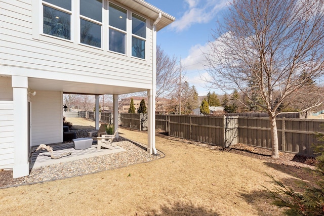 view of yard with a patio and a fenced backyard