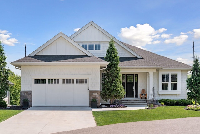 208 Byrondale Ave, Wayzata, MN 55391 - view of front of house with roof with shingles, a garage, concrete driveway, and stone siding