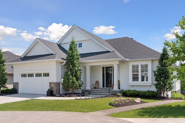 208 Byrondale Ave, Wayzata, MN 55391 - view of front of house featuring a shingled roof, concrete driveway, a garage, a front yard, and stone siding