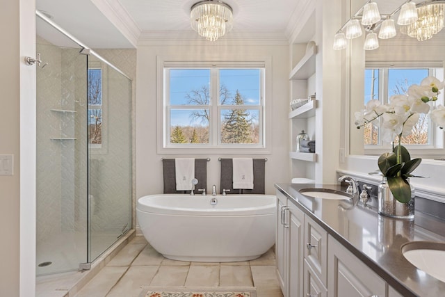208 Byrondale Ave, Wayzata, MN 55391 - bathroom featuring a chandelier, a freestanding tub, a shower stall, ornamental molding, and double vanity