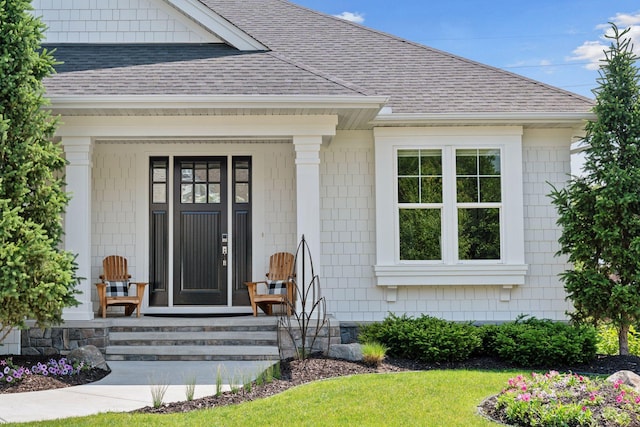 208 Byrondale Ave, Wayzata, MN 55391 - view of exterior entry with roof with shingles and covered porch