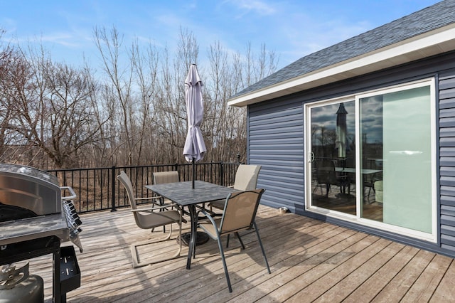 deck featuring outdoor dining area