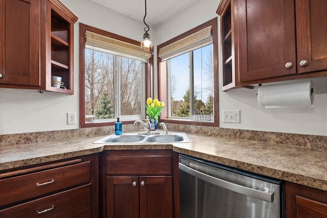 kitchen with a sink, plenty of natural light, and stainless steel dishwasher