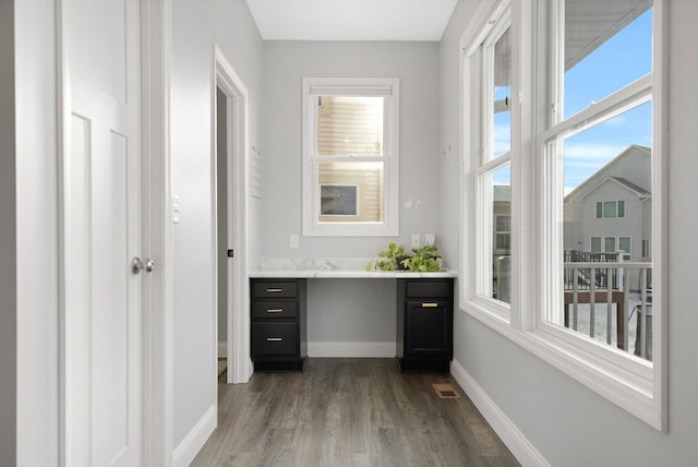 5204 Porchlight, Woodbury, MN 55129 - interior space with visible vents, baseboards, wood finished floors, and vanity