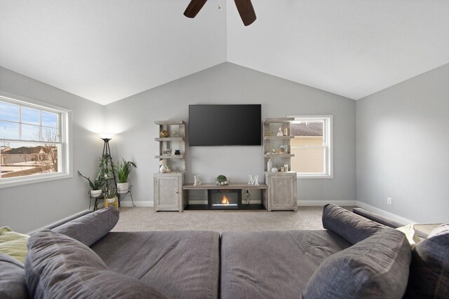 5204 Porchlight, Woodbury, MN 55129 - carpeted living room with baseboards, lofted ceiling, and a ceiling fan