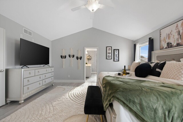 5204 Porchlight, Woodbury, MN 55129 - bedroom featuring visible vents, ceiling fan, baseboards, vaulted ceiling, and light wood-style floors