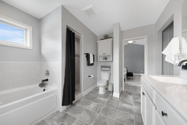 5204 Porchlight, Woodbury, MN 55129 - bathroom featuring curtained shower, ceiling fan, toilet, a bath, and vanity