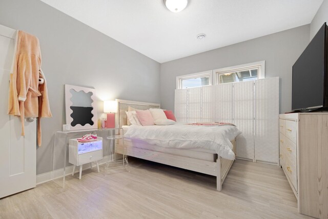 5204 Porchlight, Woodbury, MN 55129 - bedroom featuring light wood-style floors and baseboards