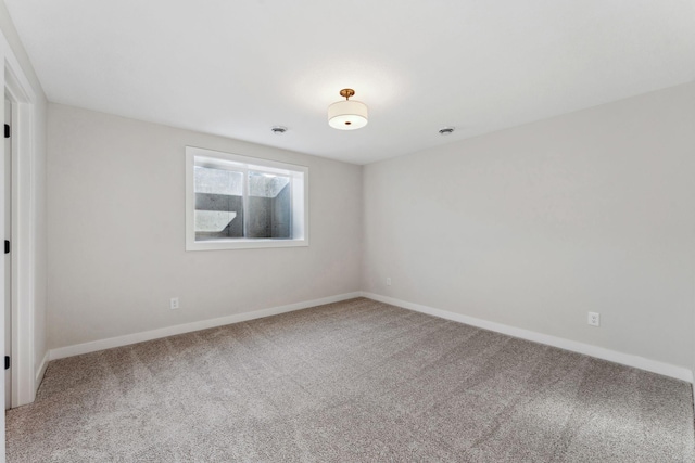 10071 Arrowwood Trl, Woodbury, MN 55129 - carpeted spare room with baseboards