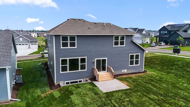 10071 Arrowwood Trl, Woodbury, MN 55129 - back of house with a residential view, a yard, and a shingled roof