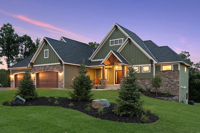 16999 Dakota St NW, Andover, MN 55304 - craftsman-style home with a yard, stone siding, a garage, and board and batten siding