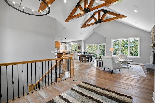 16999 Dakota St NW, Andover, MN 55304 - living area featuring beamed ceiling, recessed lighting, light wood finished floors, and high vaulted ceiling