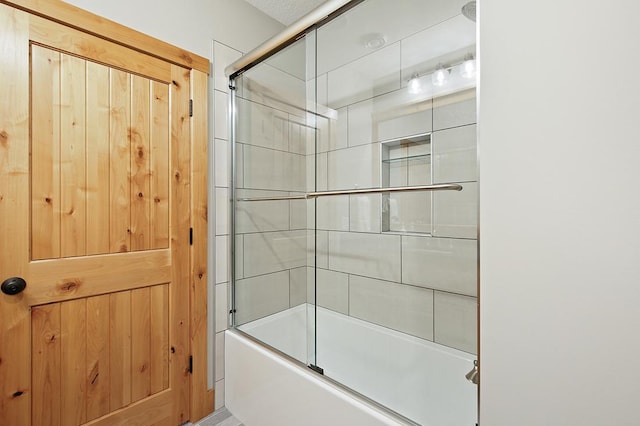 16999 Dakota St NW, Andover, MN 55304 - full bathroom featuring bath / shower combo with glass door