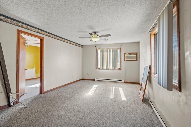 27928 Verdin St NW, Isanti, MN 55040 - carpeted empty room with a textured ceiling, a baseboard heating unit, and a ceiling fan