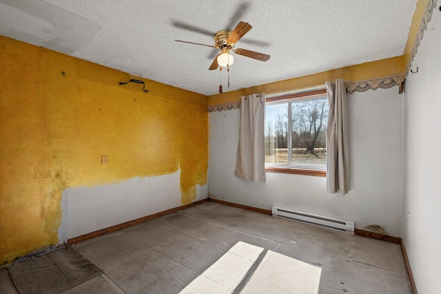 27928 Verdin St NW, Isanti, MN 55040 - empty room featuring a textured ceiling, a baseboard heating unit, baseboards, and a ceiling fan
