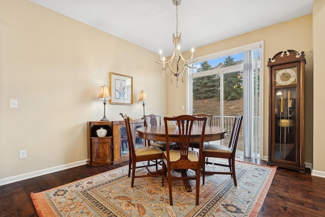 8127 Virginia Pl, Savage, MN 55378 - dining area featuring a chandelier, hardwood / wood-style floors, and baseboards