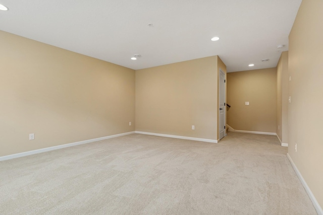 8127 Virginia Pl, Savage, MN 55378 - spare room featuring light carpet, recessed lighting, and baseboards