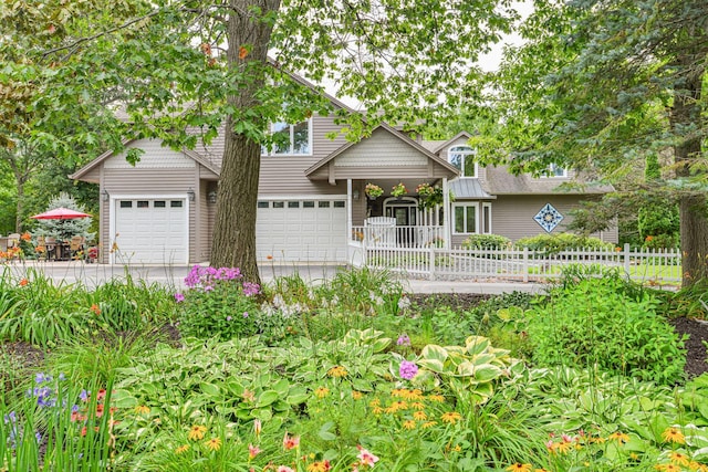 10069 Stacy Trl, Chisago City, MN 55013 - view of front of house with a garage and driveway