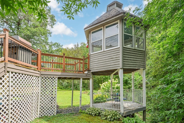 10069 Stacy Trl, Chisago City, MN 55013 - view of green lawn featuring a wooden deck