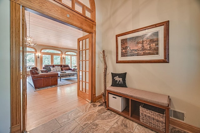10069 Stacy Trl, Chisago City, MN 55013 - hallway featuring baseboards and french doors
