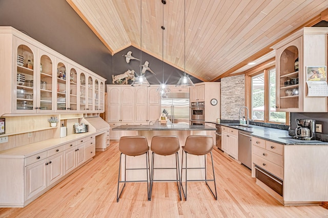 10069 Stacy Trl, Chisago City, MN 55013 - kitchen with stainless steel appliances, wood ceiling, a breakfast bar, a center island, and glass insert cabinets