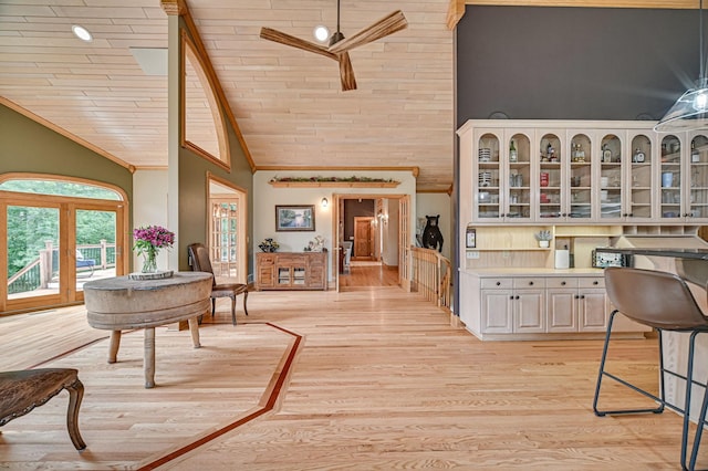 10069 Stacy Trl, Chisago City, MN 55013 - sitting room with ceiling fan, ornamental molding, light wood-type flooring, high vaulted ceiling, and wooden ceiling