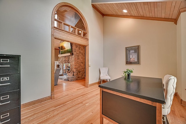 10069 Stacy Trl, Chisago City, MN 55013 - home office featuring wood ceiling, light wood finished floors, crown molding, a stone fireplace, and baseboards