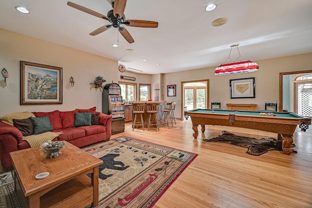 10069 Stacy Trl, Chisago City, MN 55013 - living area with pool table, wood finished floors, recessed lighting, a ceiling fan, and a bar