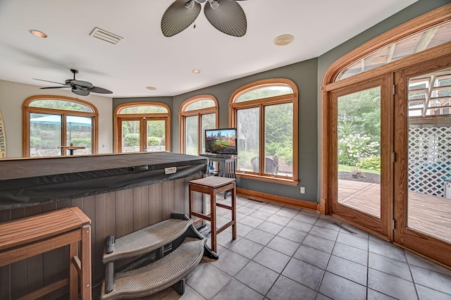 10069 Stacy Trl, Chisago City, MN 55013 - interior space featuring a ceiling fan, light tile patterned flooring, plenty of natural light, and recessed lighting