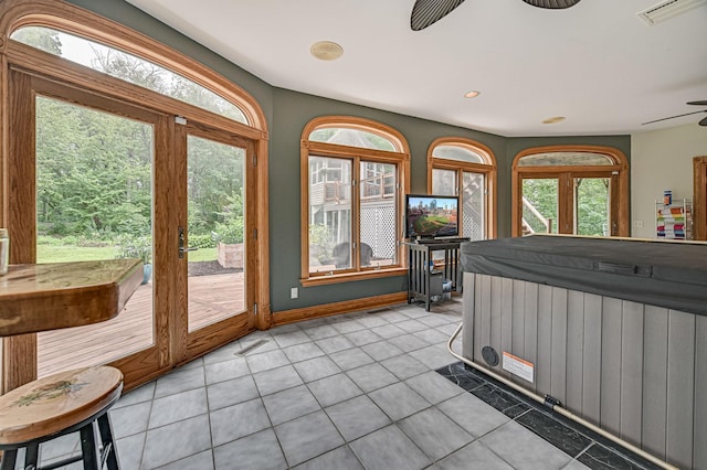 10069 Stacy Trl, Chisago City, MN 55013 - miscellaneous room with a ceiling fan, light tile patterned flooring, plenty of natural light, baseboards, and recessed lighting