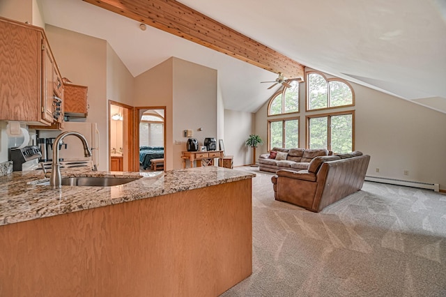 10069 Stacy Trl, Chisago City, MN 55013 - living room with a baseboard radiator, ceiling fan, high vaulted ceiling, light carpet, and beam ceiling