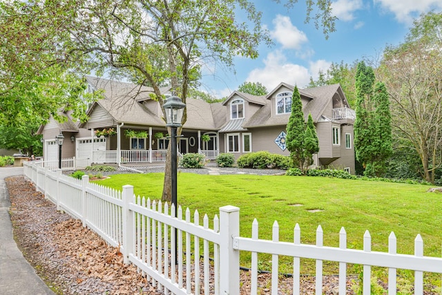 10069 Stacy Trl, Chisago City, MN 55013 - view of front facade with an attached garage, covered porch, and driveway