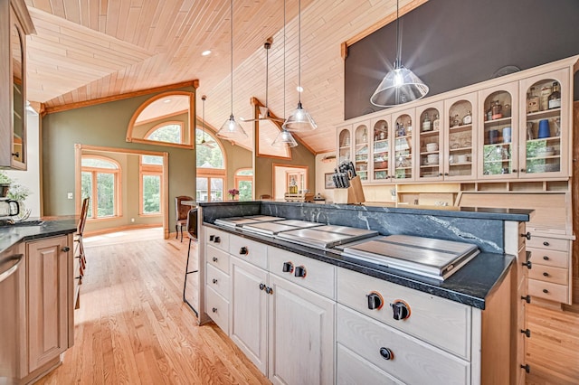 10069 Stacy Trl, Chisago City, MN 55013 - kitchen with wood ceiling, light wood-style flooring, pendant lighting, glass insert cabinets, and high vaulted ceiling