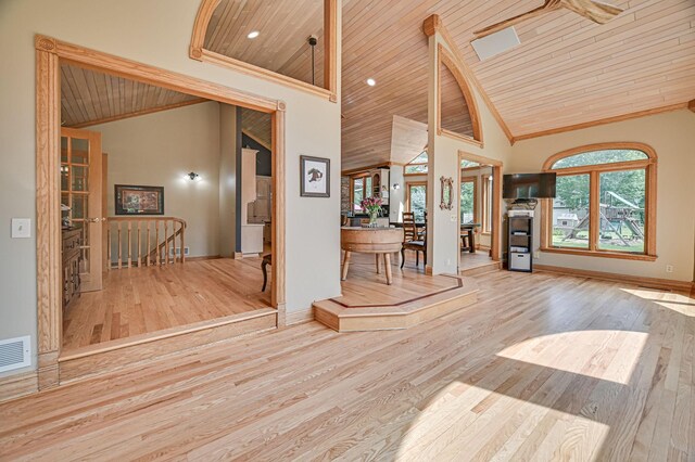 10069 Stacy Trl, Chisago City, MN 55013 - entrance foyer featuring wooden ceiling, wood finished floors, baseboards, crown molding, and high vaulted ceiling