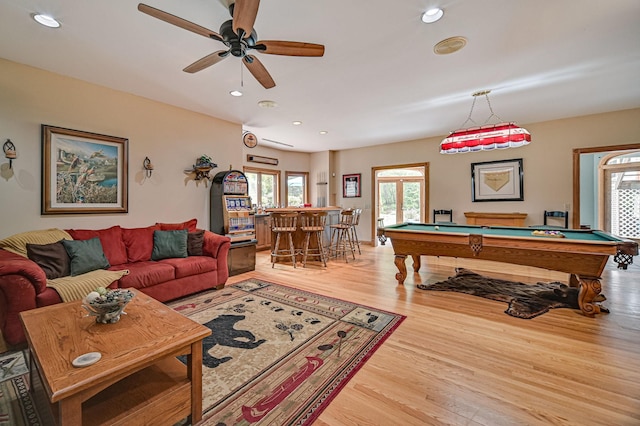 10069 Stacy Trl, Chisago City, MN 55013 - playroom with pool table, wood finished floors, recessed lighting, a ceiling fan, and a dry bar