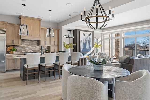 1 Hill Farm Rd Unit 210, North Oaks, MN 55127 - dining space with a chandelier and light wood finished floors