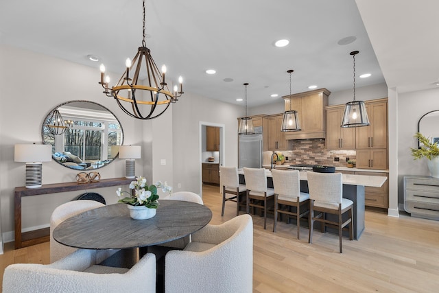 1 Hill Farm Rd Unit 210, North Oaks, MN 55127 - dining area with a chandelier, light wood-type flooring, baseboards, and recessed lighting