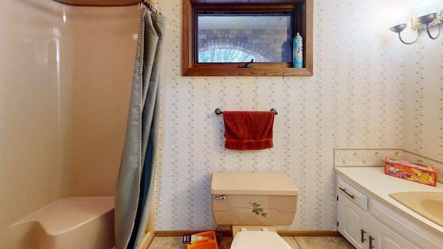 2342 75th Ave, Princeton, MN 55371 - bathroom with wallpapered walls, a shower with curtain, toilet, and vanity