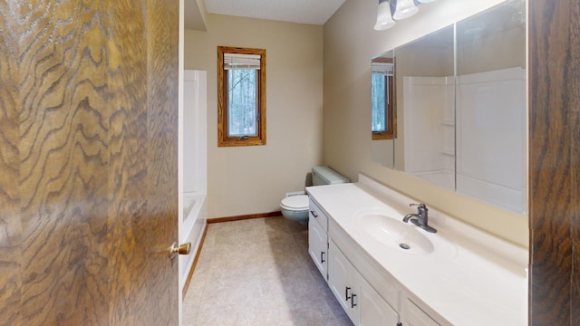 2342 75th Ave, Princeton, MN 55371 - full bath featuring vanity, baseboards, and toilet