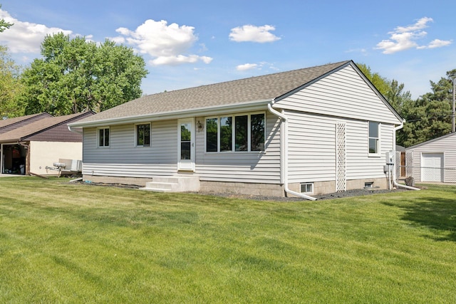 9904 95th Ave N, Maple Grove, MN 55369 - back of property featuring a shingled roof and entry steps