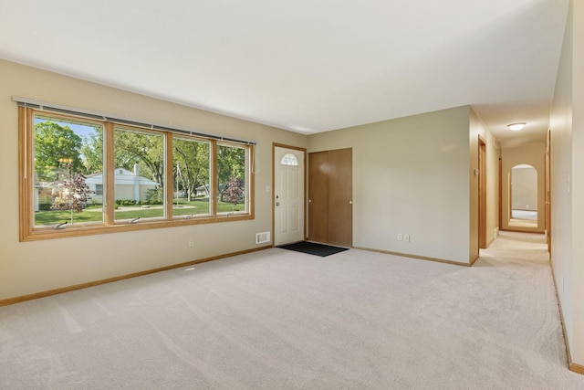 9904 95th Ave N, Maple Grove, MN 55369 - carpeted entrance foyer with baseboards
