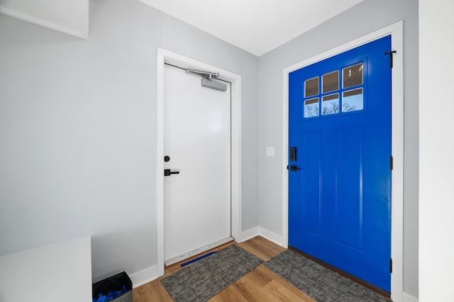 1903 Thomas Ave N, Minneapolis, MN 55411 - foyer entrance featuring baseboards and wood finished floors
