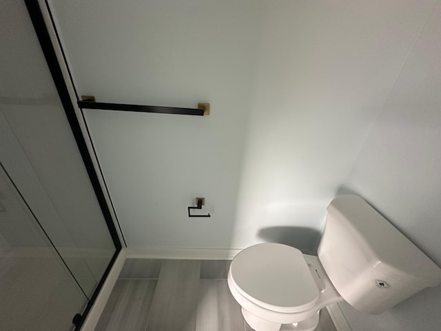 1903 Thomas Ave N, Minneapolis, MN 55411 - bathroom featuring toilet and baseboards