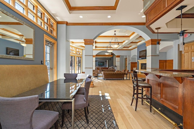 4525 Park Commons Dr Unit 221, Saint Louis Park, MN 55416 - dining room with light wood-style flooring, recessed lighting, coffered ceiling, ornamental molding, and arched walkways